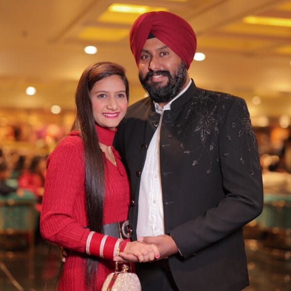 Warm candid moment of a couple at an event.