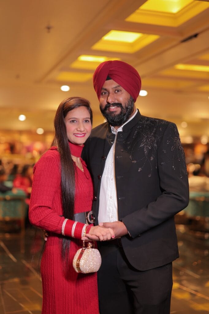 Warm candid moment of a couple at an event.