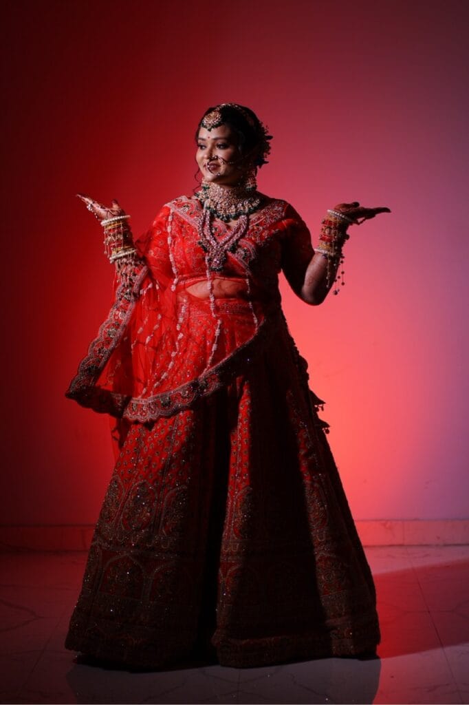 A traditional bridal photoshoot in red.