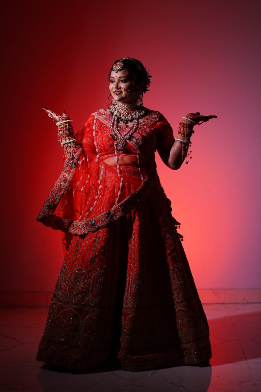 A traditional bridal photoshoot in red.