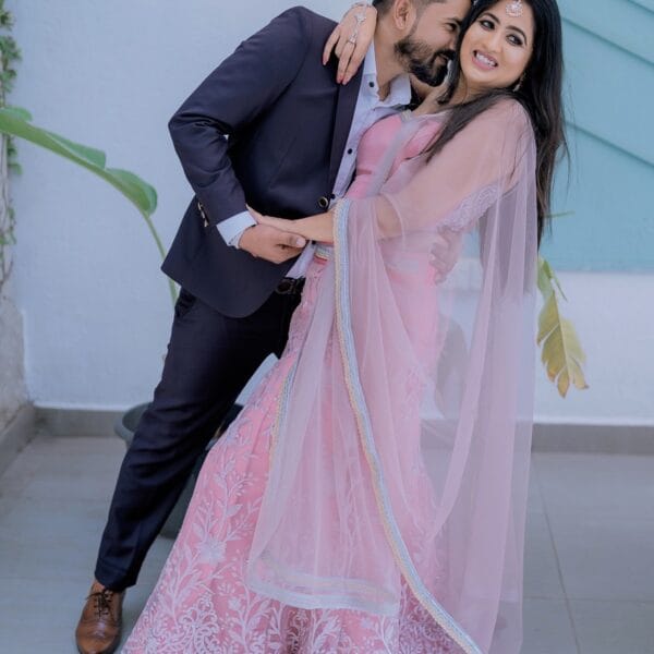 Couple enjoying a joyful photoshoot moment.